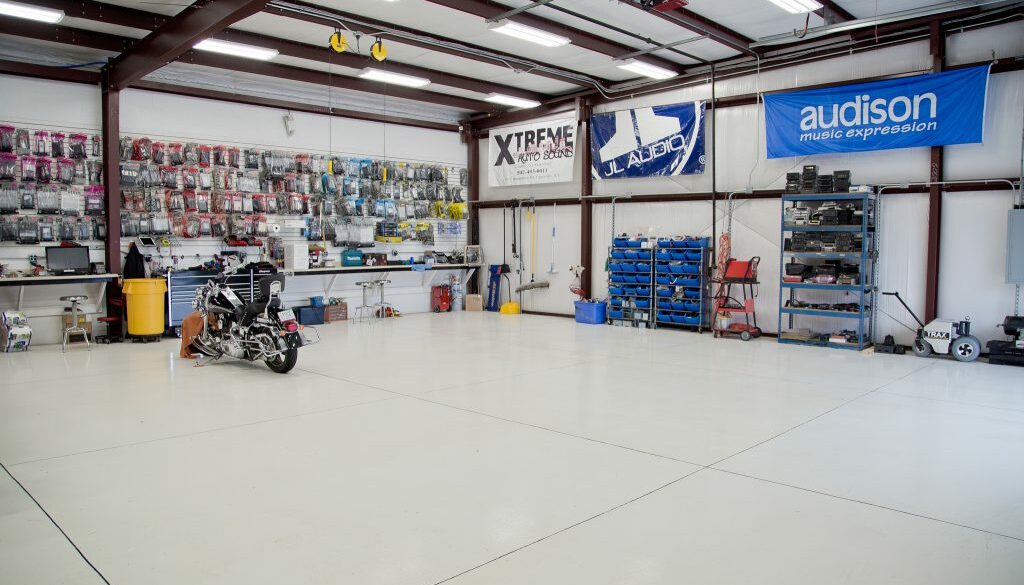 Open shop floor with motorcycle and audio accessories